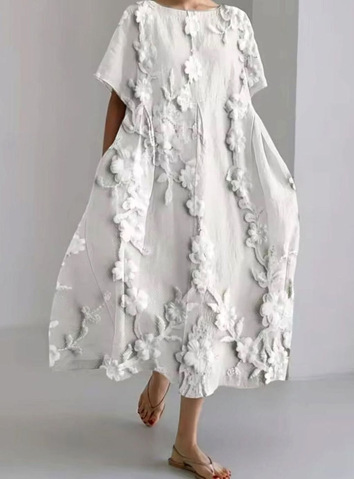 Julie | Dame Løs Midikjole Med Rund Hals Og Blomsterappliqué