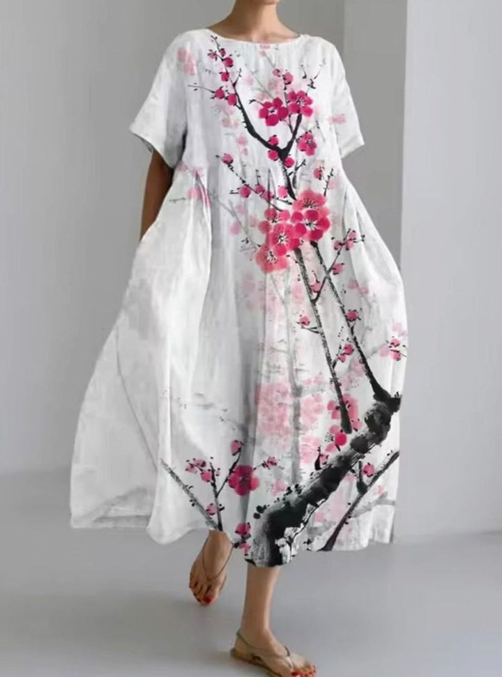 Julie | Dame Løs Midikjole Med Rund Hals Og Blomsterappliqué