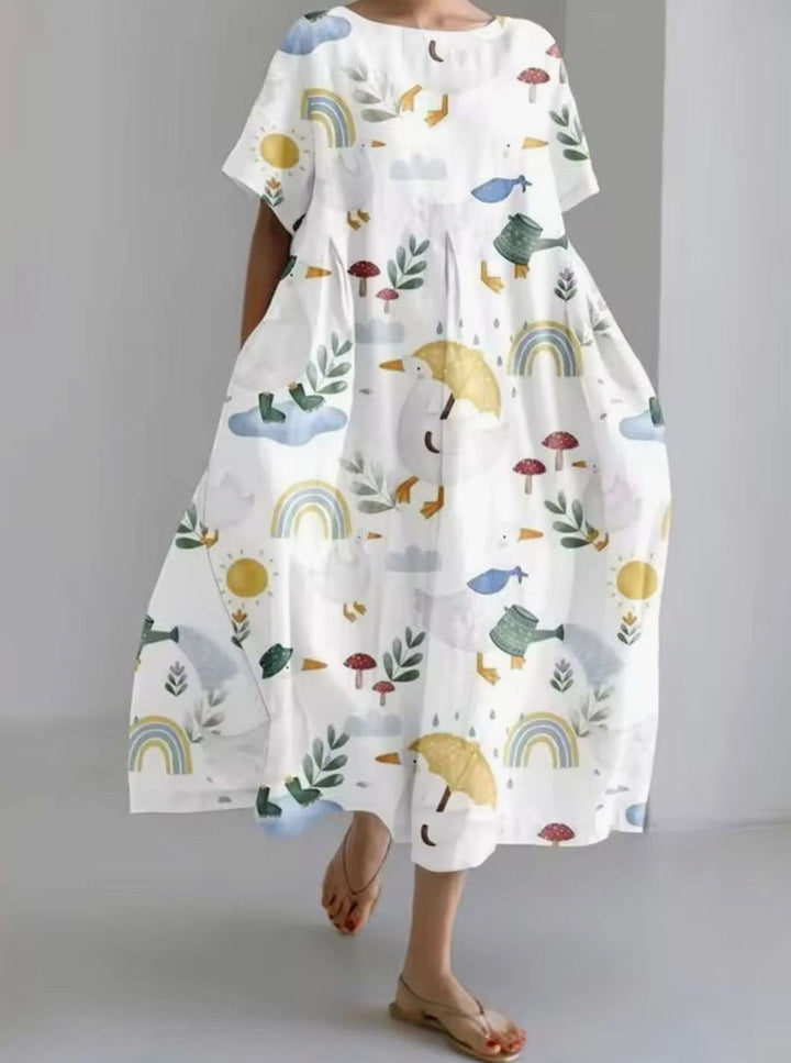 Julie | Dame Løs Midikjole Med Rund Hals Og Blomsterappliqué